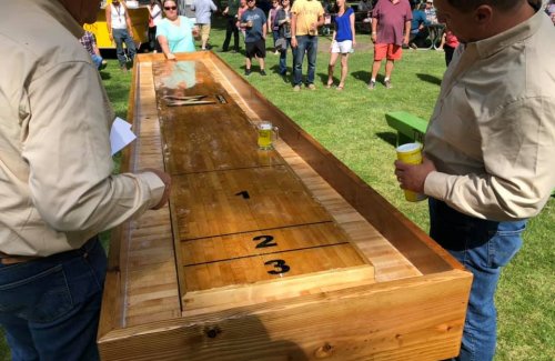 shuffle board at beer fest