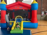 kid on bouncy house