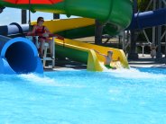 Kid exiting water slide