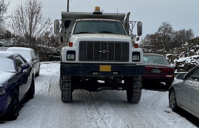 Photo of truck spreading gravel